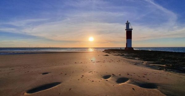 Sunset on lighthouse in Galinhos Brazil